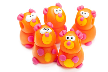 Group of clay toys (bears). Isolated on white background