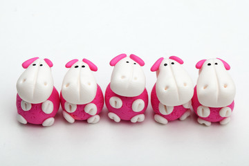 Group of clay toys (hippo). Isolated on white background, horizo