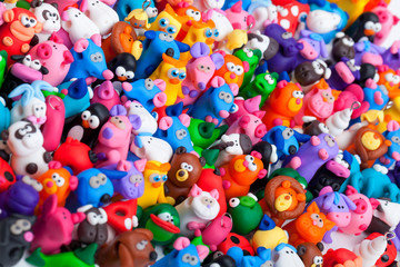 Large group of clay toys. Horizontal shot, high angle
