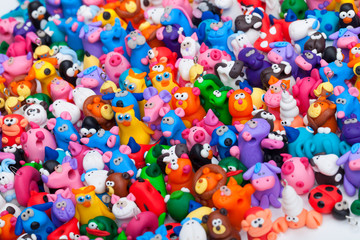 Fototapeta na wymiar Large group of clay toys. Horizontal shot, high angle