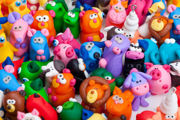 Large group of clay toys. Horizontal shot, high angle, close up