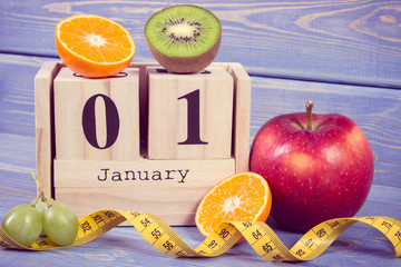 Vintage photo, Cube calendar, fruits and tape measure, new years resolutions