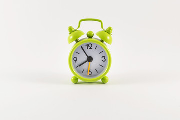 Alarm clock on white background