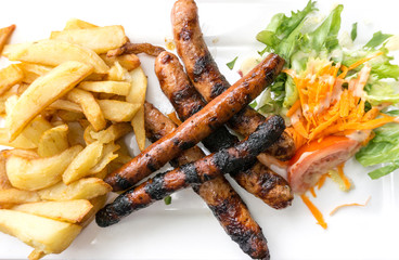Grilled sausage served with french fries