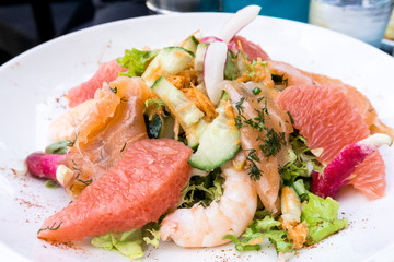 Delicious fresh salad and olive oil