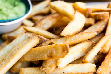 Golden French fries potatoes ready to be eaten
