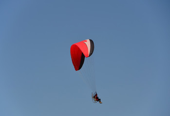 Paraglider on clear sky