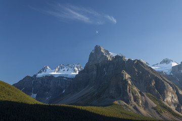 Moon over Mount Temple in Banff National Park, Canada.