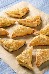 Puff pastry triangles filled with feta cheese and leek.
