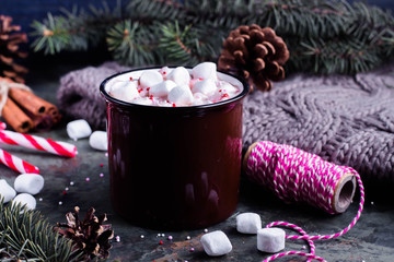 Obraz na płótnie Canvas Hot Chocolate with Marshmallows in a Ceramic Cup on table. Festive decoration. Xmas concept. Winter holiday drink