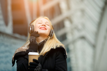 Plakat Girl with headphones listening music