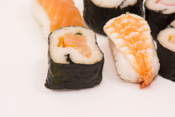 Pieces of sushi on white background