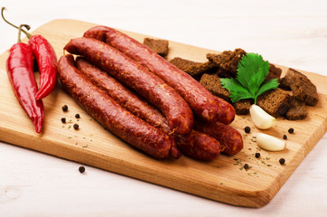 Smoked salami sausage with garlic, croutons and hot peppers