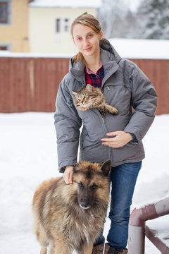 Teenager girl with her pets