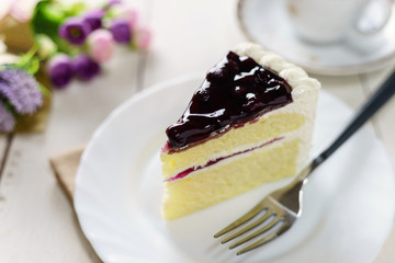blueberry cake and cup of tea