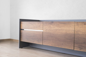 tv stand with white cement wall