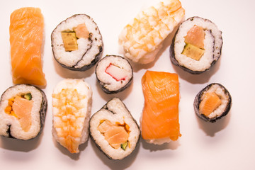Pieces of sushi on white background