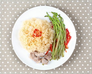 Thai spicy fried snow fungus mushroom with morning glory.