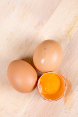 Flat lay eggs on the table yolk wooden table
