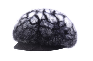 Women's fur hat with a visor is isolated on white