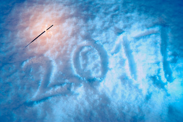 new year, figures on the snow,