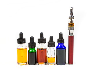 Assorted flavors of vape juice and an ecigarette isolated on white background