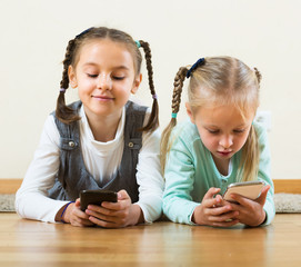 Girls playing online with phones