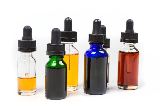 Assorted Flavors Of Vape Juice Isolated On White Background