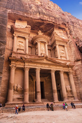 tourists at the temple of El Khazneh in the capital of the Nabataean Kingdom, Jordan