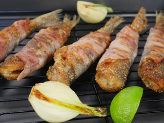 fried fishes herrings on plate