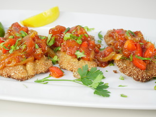 fried fish herring with tomato sauce