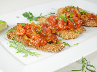 fried fish herring with tomato sauce