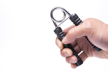 ハンドグリッパーを握る手