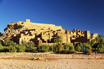 Fototapeta premium Ait Benhaddou kasbah, along the former caravan route between Sahara and Marrakesh, Morocco, situated in Souss Massa Draa on a hill along the Ounila River