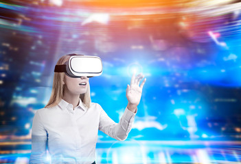 Blond woman in vr glasses in futuristic environment