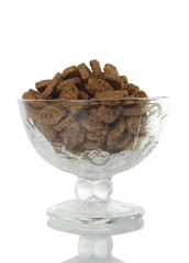 salted crackers in a vase on white background. dry bread