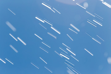 rain drops on a background of blue sky