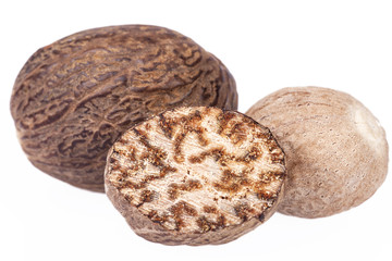 Nutmeg ,  half and whole isolated on white background