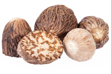 Nutmeg ,  half and whole isolated on white background