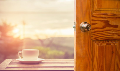 Women hand open door knob or opening the door.