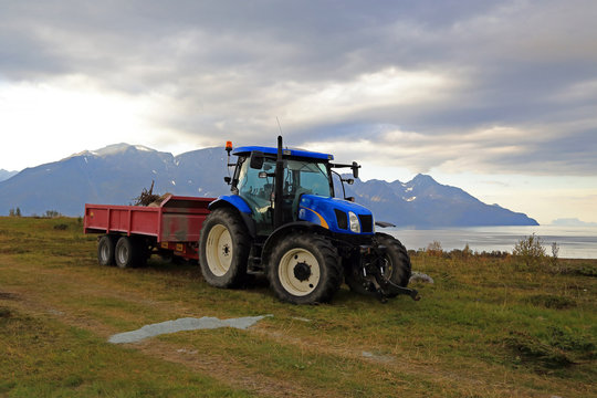 Blue tractor on nature
