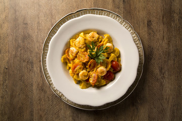Pumpkin farfalle with shrimp and cherry tomato