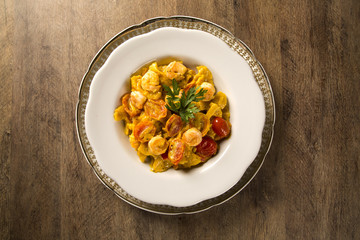 Pumpkin farfalle with shrimp and cherry tomato