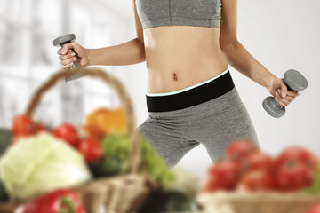 slim woman body and vegetables 