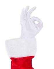 Santa Claus hand showing Okey gesture isolated on white background