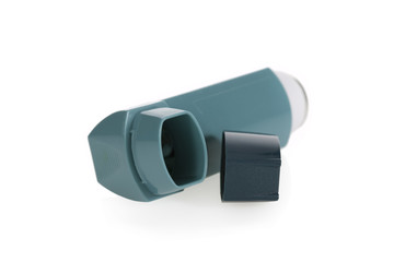 Asthma inhaler isolated on a white background.