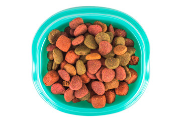 Dry dog treats in bowl isolated on white