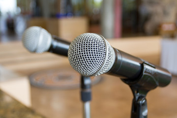 microphone on stage with blur outdoor background