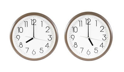 Two brown wall clock isolated on white background.Wall clock at
