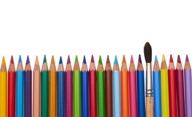 Color pencil row and one paintbrush